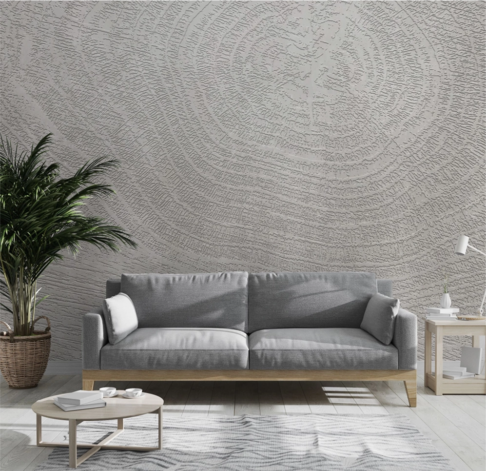 PEBBLD abstract wallpaper collection paired with modern grey couch