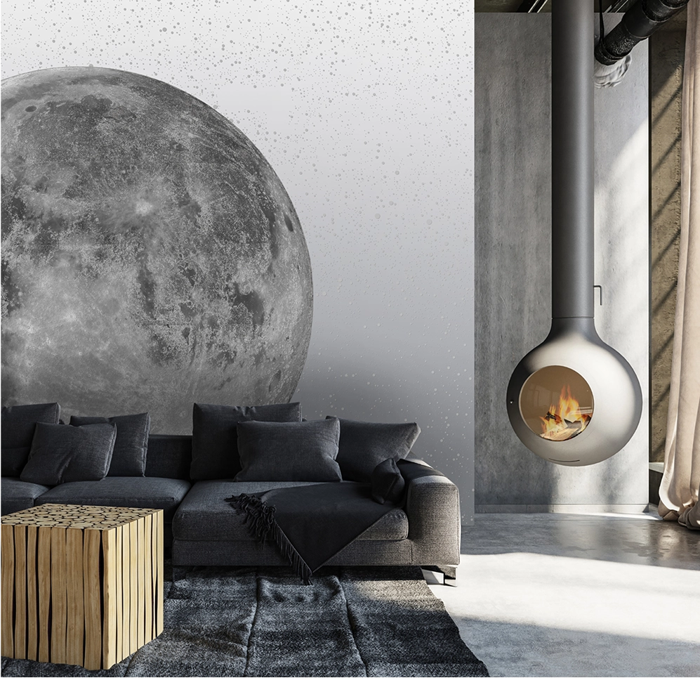 PEBBLD moon-themed wallpaper with black couch and minimalist interior