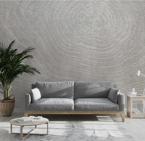 PEBBLD abstract wallpaper collection paired with modern grey couch