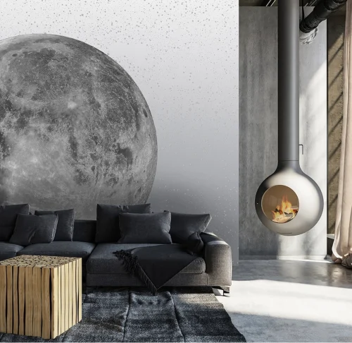 PEBBLD moon-themed wallpaper with black couch and minimalist interior